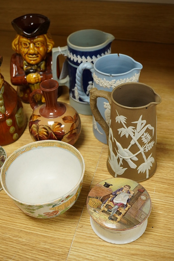 Sundry ceramics to include; Two Prattware pot lids and bases, two Toby jugs, Copeland Spode jug and others (9). Condition - fair